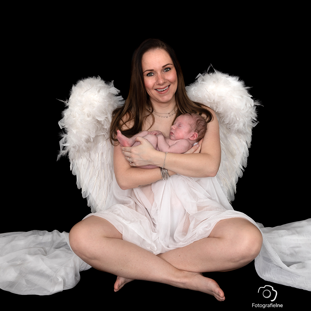 Fotografie Ine zangerschapsshoot – zwanger zwanger met vleugels fotograaf Boekel